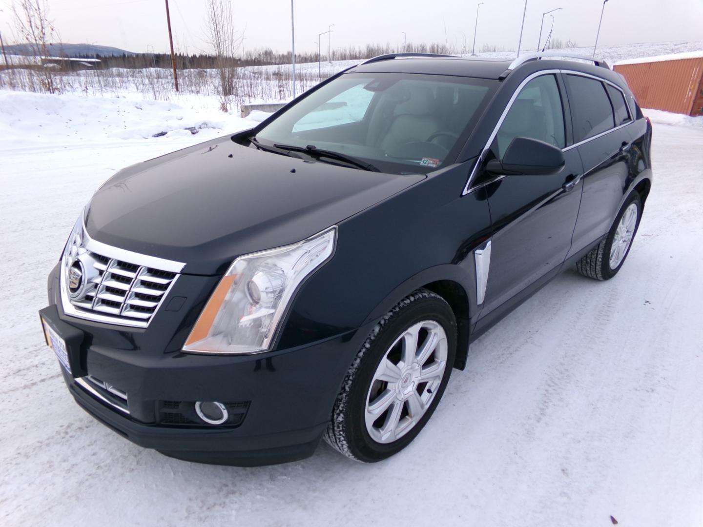 2014 Black Cadillac SRX Performance Collection FWD (3GYFNCE37ES) with an 3.6L V6 DOHC 24V FFV engine, 6-Speed Automatic transmission, located at 2630 Philips Field Rd., Fairbanks, AK, 99709, (907) 458-0593, 64.848068, -147.780609 - Photo#0